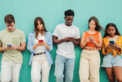 Young people using their smartphones.